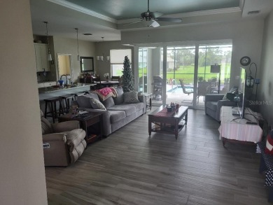 As you enter this 3 bedroom,  2 &1/2 bath, 3 car garage, canal on Rotonda Golf and Country Club - Long Marsh  in Florida - for sale on GolfHomes.com, golf home, golf lot