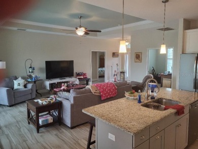 As you enter this 3 bedroom,  2 &1/2 bath, 3 car garage, canal on Rotonda Golf and Country Club - Long Marsh  in Florida - for sale on GolfHomes.com, golf home, golf lot