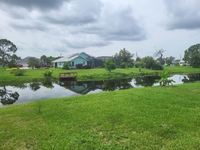 As you enter this 3 bedroom,  2 &1/2 bath, 3 car garage, canal on Rotonda Golf and Country Club - Long Marsh  in Florida - for sale on GolfHomes.com, golf home, golf lot
