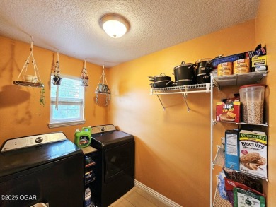 Charming 3-Bedroom, 2-Bath in Desirable Cedar Ridge - Carl on Twin Hills Golf and Country Club in Missouri - for sale on GolfHomes.com, golf home, golf lot