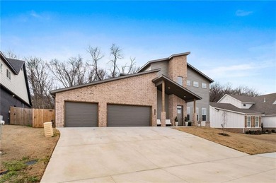 Discover this gorgeous upscale modern home that feels better on Big Sugar Golf Club in Arkansas - for sale on GolfHomes.com, golf home, golf lot