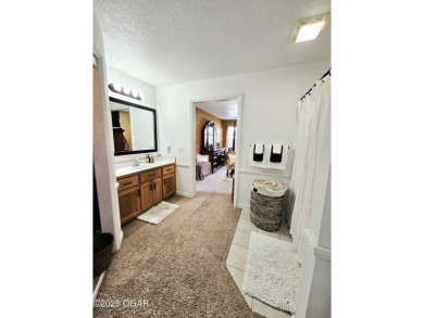 Charming 3-Bedroom, 2-Bath in Desirable Cedar Ridge - Carl on Twin Hills Golf and Country Club in Missouri - for sale on GolfHomes.com, golf home, golf lot