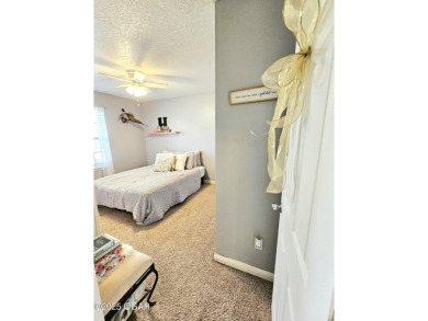 Charming 3-Bedroom, 2-Bath in Desirable Cedar Ridge - Carl on Twin Hills Golf and Country Club in Missouri - for sale on GolfHomes.com, golf home, golf lot