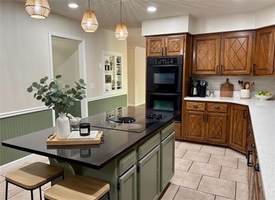 Packed with potential, this 3-bed, 3.5-bath Bella Vista ranch on Bella Vista Country Club - Scottsdale in Arkansas - for sale on GolfHomes.com, golf home, golf lot