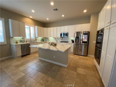 Welcome to this beautifully upgraded Emerald model home, located on Oak Valley Golf Club in California - for sale on GolfHomes.com, golf home, golf lot