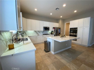 Welcome to this beautifully upgraded Emerald model home, located on Oak Valley Golf Club in California - for sale on GolfHomes.com, golf home, golf lot