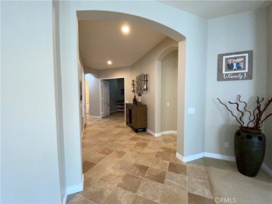 Welcome to this beautifully upgraded Emerald model home, located on Oak Valley Golf Club in California - for sale on GolfHomes.com, golf home, golf lot