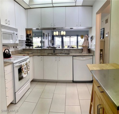 FURNISHED and TURNKEY! ABSOLUTELY BEAUTIFUL and UNIQUE BUNDLED on Golfview Golf and Racquet Club in Florida - for sale on GolfHomes.com, golf home, golf lot