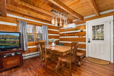 Welcome to Bear's Den, a beautiful Hearthstone LOG CABIN located on Alpine Lake Resort in West Virginia - for sale on GolfHomes.com, golf home, golf lot