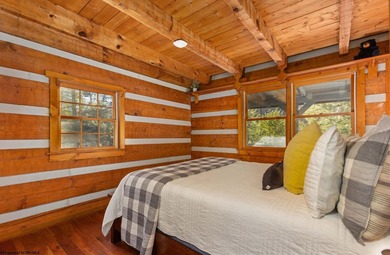 Welcome to Bear's Den, a beautiful Hearthstone LOG CABIN located on Alpine Lake Resort in West Virginia - for sale on GolfHomes.com, golf home, golf lot