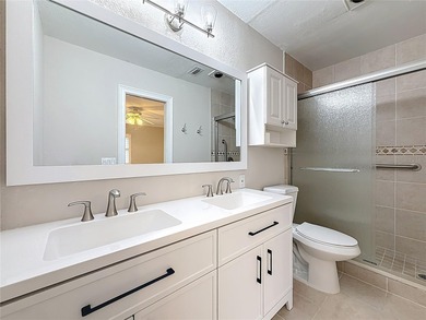 This Mariner Pass unit lives up to its name with a deep-water on Mangrove Bay Golf Course in Florida - for sale on GolfHomes.com, golf home, golf lot