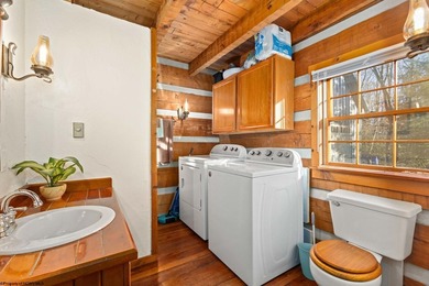 Welcome to Bear's Den, a beautiful Hearthstone LOG CABIN located on Alpine Lake Resort in West Virginia - for sale on GolfHomes.com, golf home, golf lot