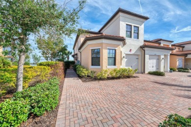 This stunning, rarely available, first level end-unit Bella Casa on Sarasota National Golf Club in Florida - for sale on GolfHomes.com, golf home, golf lot