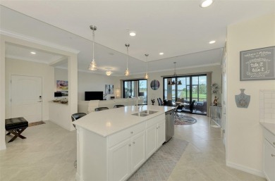 This stunning, rarely available, first level end-unit Bella Casa on Sarasota National Golf Club in Florida - for sale on GolfHomes.com, golf home, golf lot