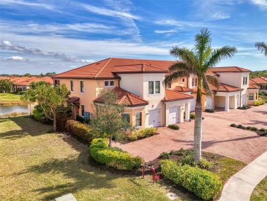 This stunning, rarely available, first level end-unit Bella Casa on Sarasota National Golf Club in Florida - for sale on GolfHomes.com, golf home, golf lot