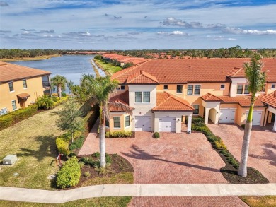 This stunning, rarely available, first level end-unit Bella Casa on Sarasota National Golf Club in Florida - for sale on GolfHomes.com, golf home, golf lot