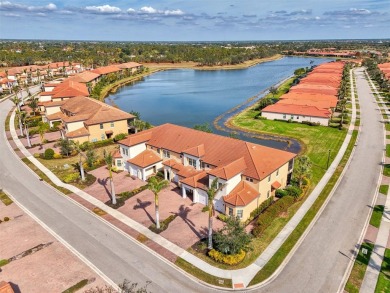 This stunning, rarely available, first level end-unit Bella Casa on Sarasota National Golf Club in Florida - for sale on GolfHomes.com, golf home, golf lot