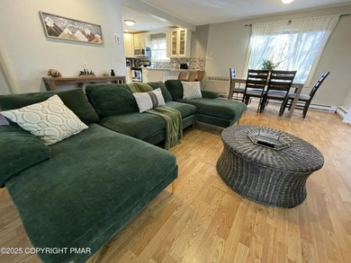 Welcome to your new mountain retreat! This beautiful 3-bedroom on Pocono Farms Country Club in Pennsylvania - for sale on GolfHomes.com, golf home, golf lot