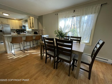 Welcome to your new mountain retreat! This beautiful 3-bedroom on Pocono Farms Country Club in Pennsylvania - for sale on GolfHomes.com, golf home, golf lot