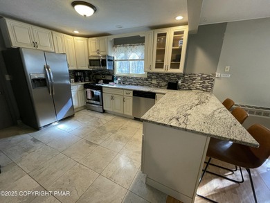 Welcome to your new mountain retreat! This beautiful 3-bedroom on Pocono Farms Country Club in Pennsylvania - for sale on GolfHomes.com, golf home, golf lot