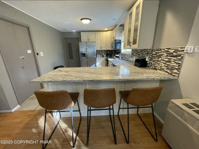 Welcome to your new mountain retreat! This beautiful 3-bedroom on Pocono Farms Country Club in Pennsylvania - for sale on GolfHomes.com, golf home, golf lot