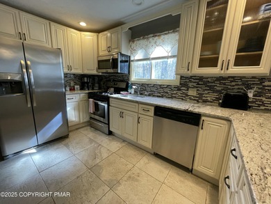 Welcome to your new mountain retreat! This beautiful 3-bedroom on Pocono Farms Country Club in Pennsylvania - for sale on GolfHomes.com, golf home, golf lot