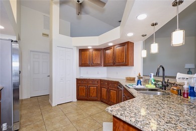 Spacious 3 bedroom 2 bath pool home in CAPE ROYAL, a gated golf on Royal Tee Country Club in Florida - for sale on GolfHomes.com, golf home, golf lot