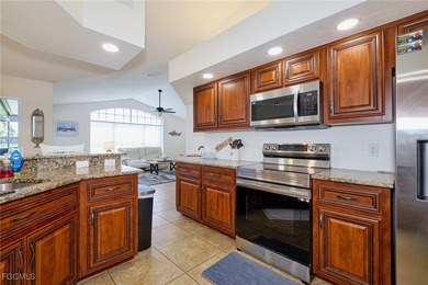 Spacious 3 bedroom 2 bath pool home in CAPE ROYAL, a gated golf on Royal Tee Country Club in Florida - for sale on GolfHomes.com, golf home, golf lot