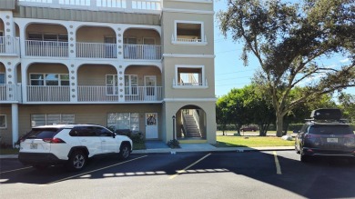 Bright End Unit with Great Potential in Clearwater's Premier 55+ on On Top Of The World Golf Course in Florida - for sale on GolfHomes.com, golf home, golf lot
