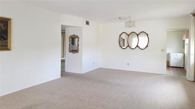 Bright End Unit with Great Potential in Clearwater's Premier 55+ on On Top Of The World Golf Course in Florida - for sale on GolfHomes.com, golf home, golf lot