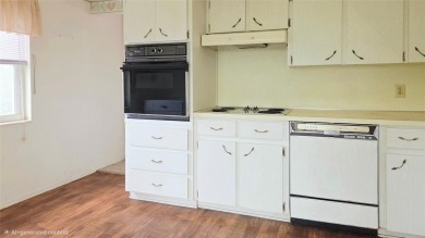 Bright End Unit with Great Potential in Clearwater's Premier 55+ on On Top Of The World Golf Course in Florida - for sale on GolfHomes.com, golf home, golf lot