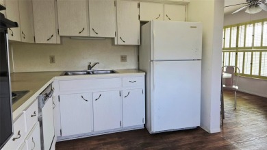 Bright End Unit with Great Potential in Clearwater's Premier 55+ on On Top Of The World Golf Course in Florida - for sale on GolfHomes.com, golf home, golf lot