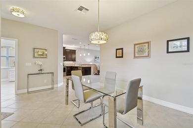 An opportunity to own a Nantucket model villa with a water view on Caloosa Greens Executive Golf Course in Florida - for sale on GolfHomes.com, golf home, golf lot