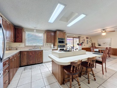 Amazing & Well-Maintained Palm Harbor Home - Premium Waterfront on Plantation Golf Club in Florida - for sale on GolfHomes.com, golf home, golf lot