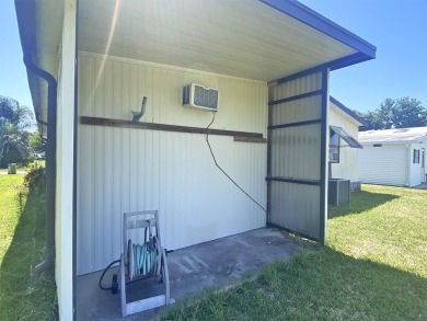 If we told you that the enclosed storage room attached boasts as on Lakes at Leesburg Golf Course in Florida - for sale on GolfHomes.com, golf home, golf lot