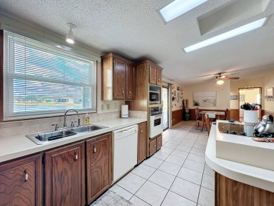 Amazing & Well-Maintained Palm Harbor Home - Premium Waterfront on Plantation Golf Club in Florida - for sale on GolfHomes.com, golf home, golf lot