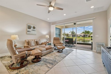 An opportunity to own a Nantucket model villa with a water view on Caloosa Greens Executive Golf Course in Florida - for sale on GolfHomes.com, golf home, golf lot