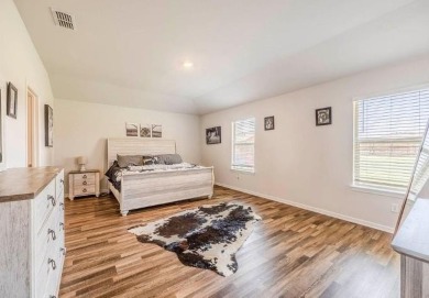 Welcome to this beautiful single-story home featuring 4 bedrooms on Cross Timbers Golf Course in Texas - for sale on GolfHomes.com, golf home, golf lot