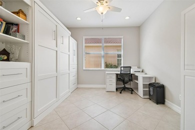 An opportunity to own a Nantucket model villa with a water view on Caloosa Greens Executive Golf Course in Florida - for sale on GolfHomes.com, golf home, golf lot