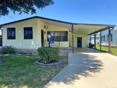 If we told you that the enclosed storage room attached boasts as on Lakes at Leesburg Golf Course in Florida - for sale on GolfHomes.com, golf home, golf lot