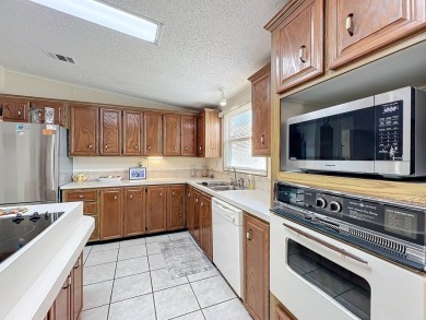 Amazing & Well-Maintained Palm Harbor Home - Premium Waterfront on Plantation Golf Club in Florida - for sale on GolfHomes.com, golf home, golf lot