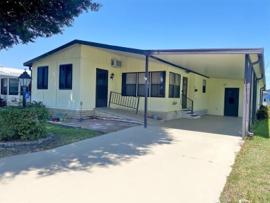 If we told you that the enclosed storage room attached boasts as on Lakes at Leesburg Golf Course in Florida - for sale on GolfHomes.com, golf home, golf lot