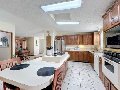 Amazing & Well-Maintained Palm Harbor Home - Premium Waterfront on Plantation Golf Club in Florida - for sale on GolfHomes.com, golf home, golf lot