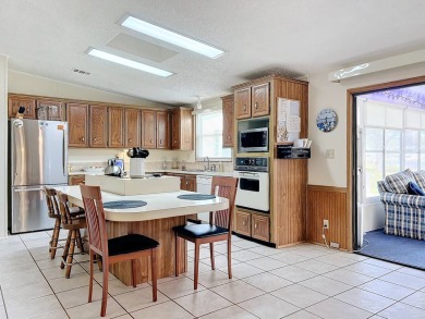 Amazing & Well-Maintained Palm Harbor Home - Premium Waterfront on Plantation Golf Club in Florida - for sale on GolfHomes.com, golf home, golf lot
