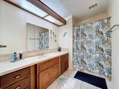 Amazing & Well-Maintained Palm Harbor Home - Premium Waterfront on Plantation Golf Club in Florida - for sale on GolfHomes.com, golf home, golf lot