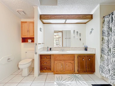Amazing & Well-Maintained Palm Harbor Home - Premium Waterfront on Plantation Golf Club in Florida - for sale on GolfHomes.com, golf home, golf lot