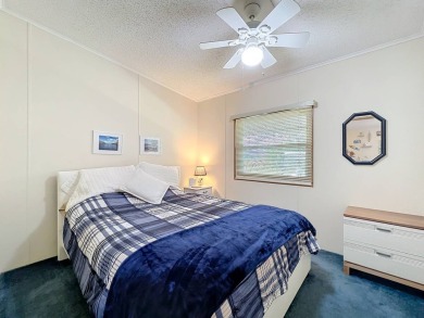 Amazing & Well-Maintained Palm Harbor Home - Premium Waterfront on Plantation Golf Club in Florida - for sale on GolfHomes.com, golf home, golf lot