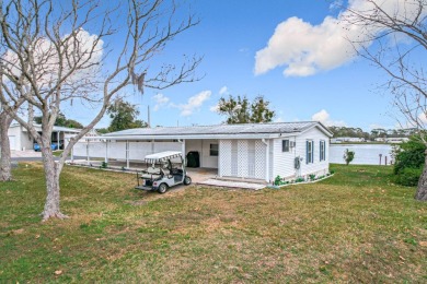 Amazing & Well-Maintained Palm Harbor Home - Premium Waterfront on Plantation Golf Club in Florida - for sale on GolfHomes.com, golf home, golf lot