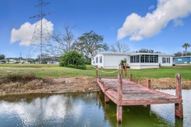 Amazing Waterfront Home in Palm Harbor - Immaculate, Turnkey & on Plantation Golf Club in Florida - for sale on GolfHomes.com, golf home, golf lot