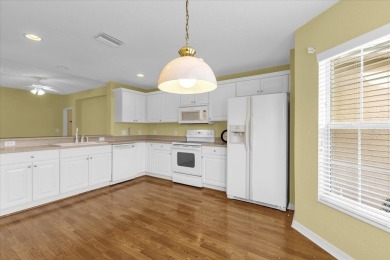 Welcome to this beautifully maintained Challedon model home in on Eagle Ridge At Spruce Creek Country Club in Florida - for sale on GolfHomes.com, golf home, golf lot